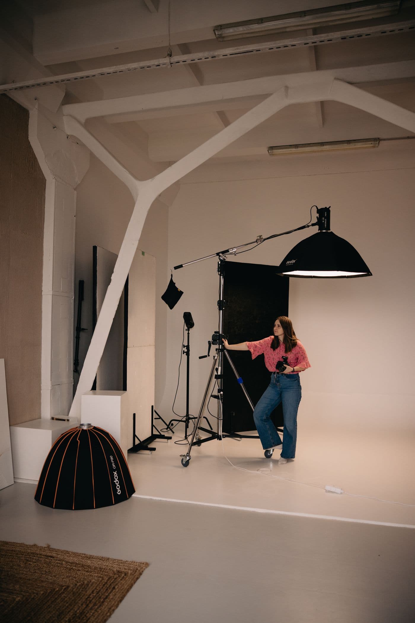 Creative professional preparing a photography studio